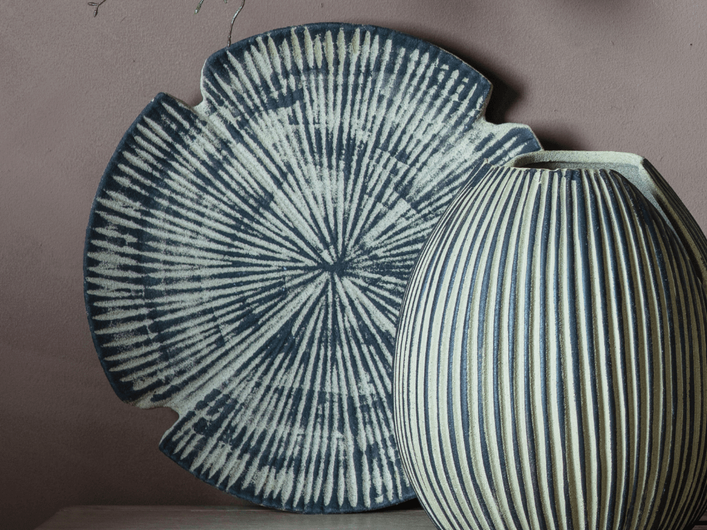 scandi decor displaying rustic plate and vase