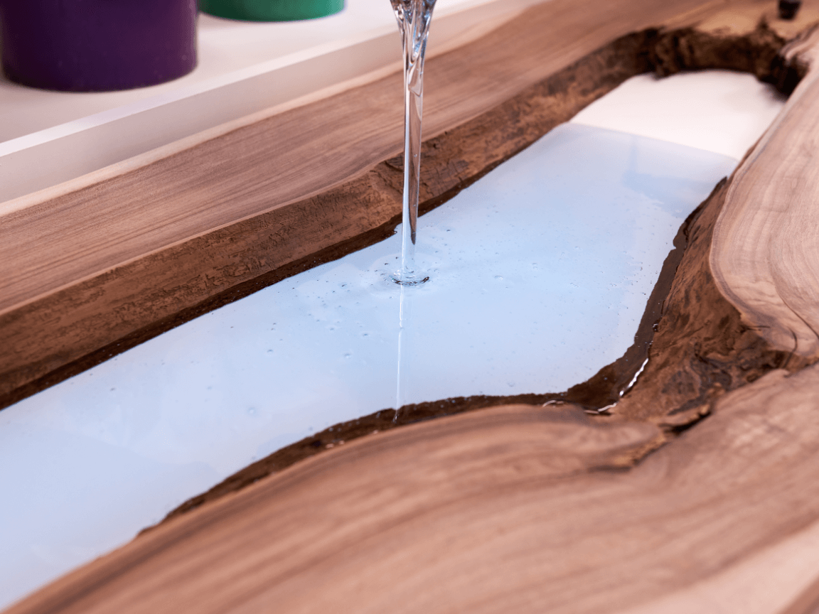 pouring epoxy for an epoxy table